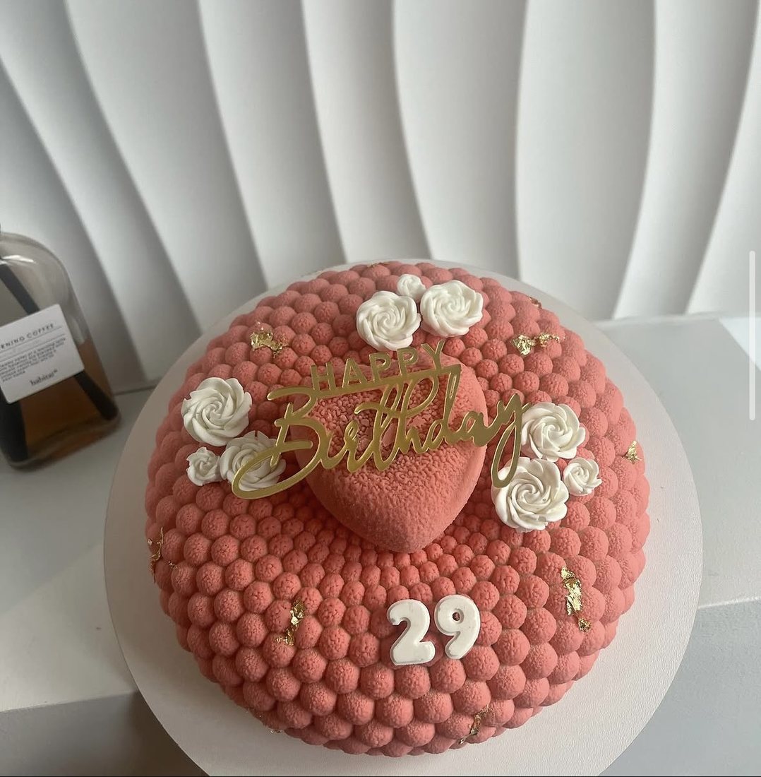 Coral bubble textured mousse cake with white roses for a 29th birthday