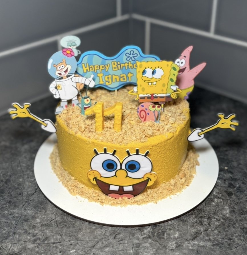 Yellow SpongeBob SquarePants themed birthday cake for an 11th birthday