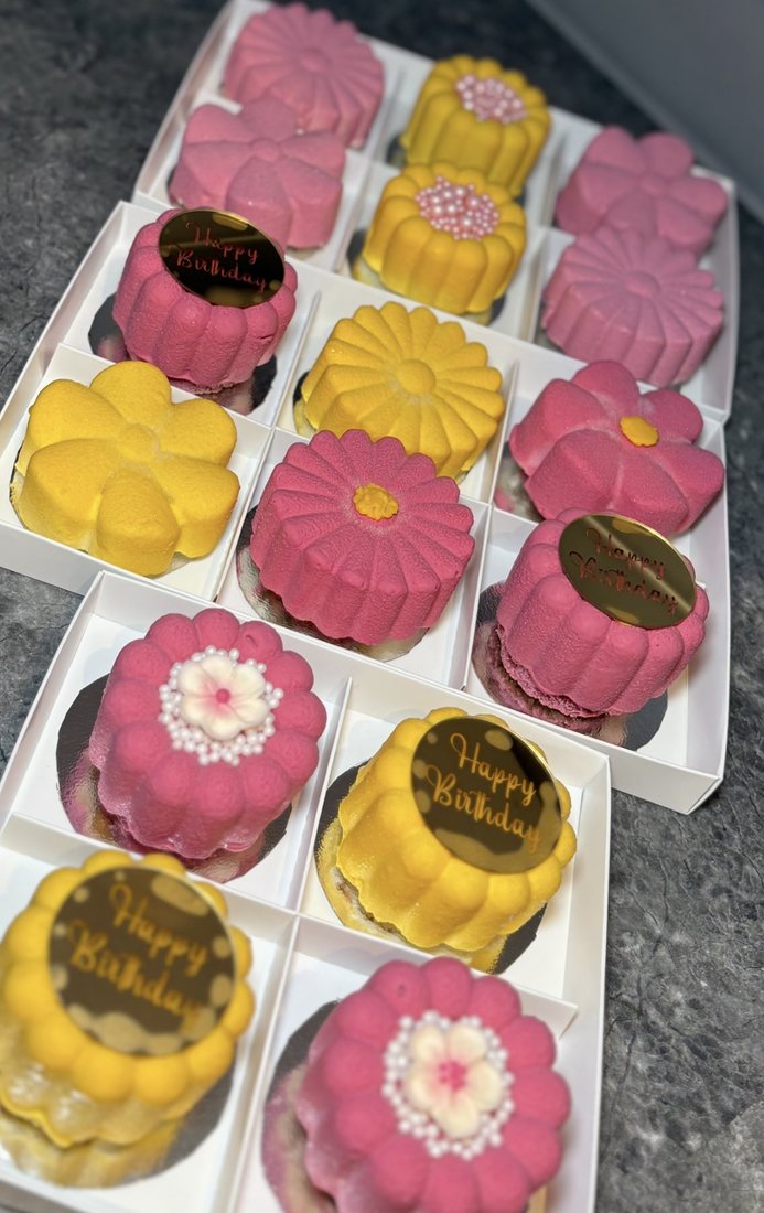 Pink and yellow birthday mousse cake assortment box of twelve