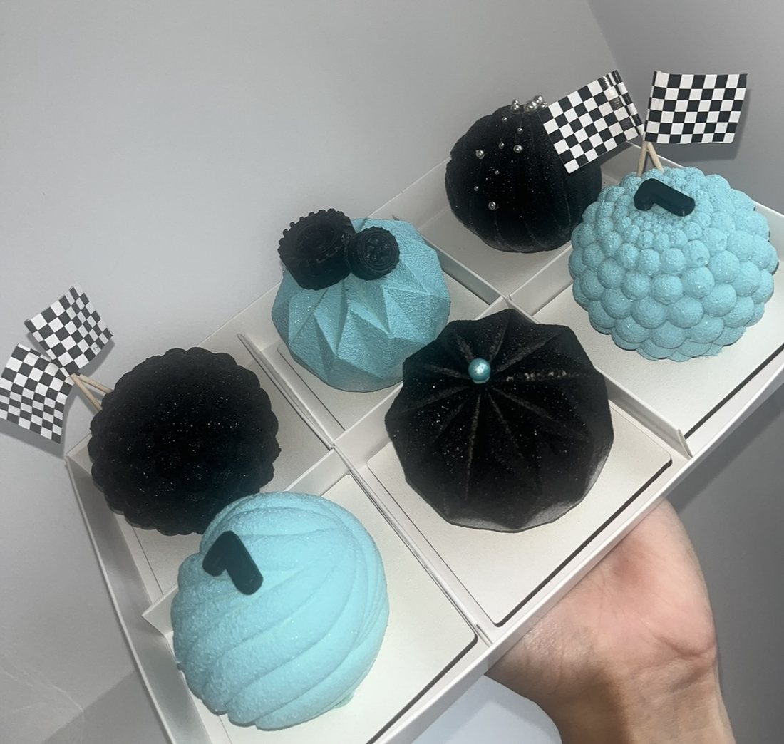 Black and teal race car themed mousse cake box of six