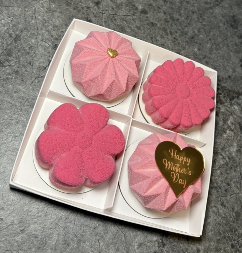 Box of four pink Mother's Day mousse cakes