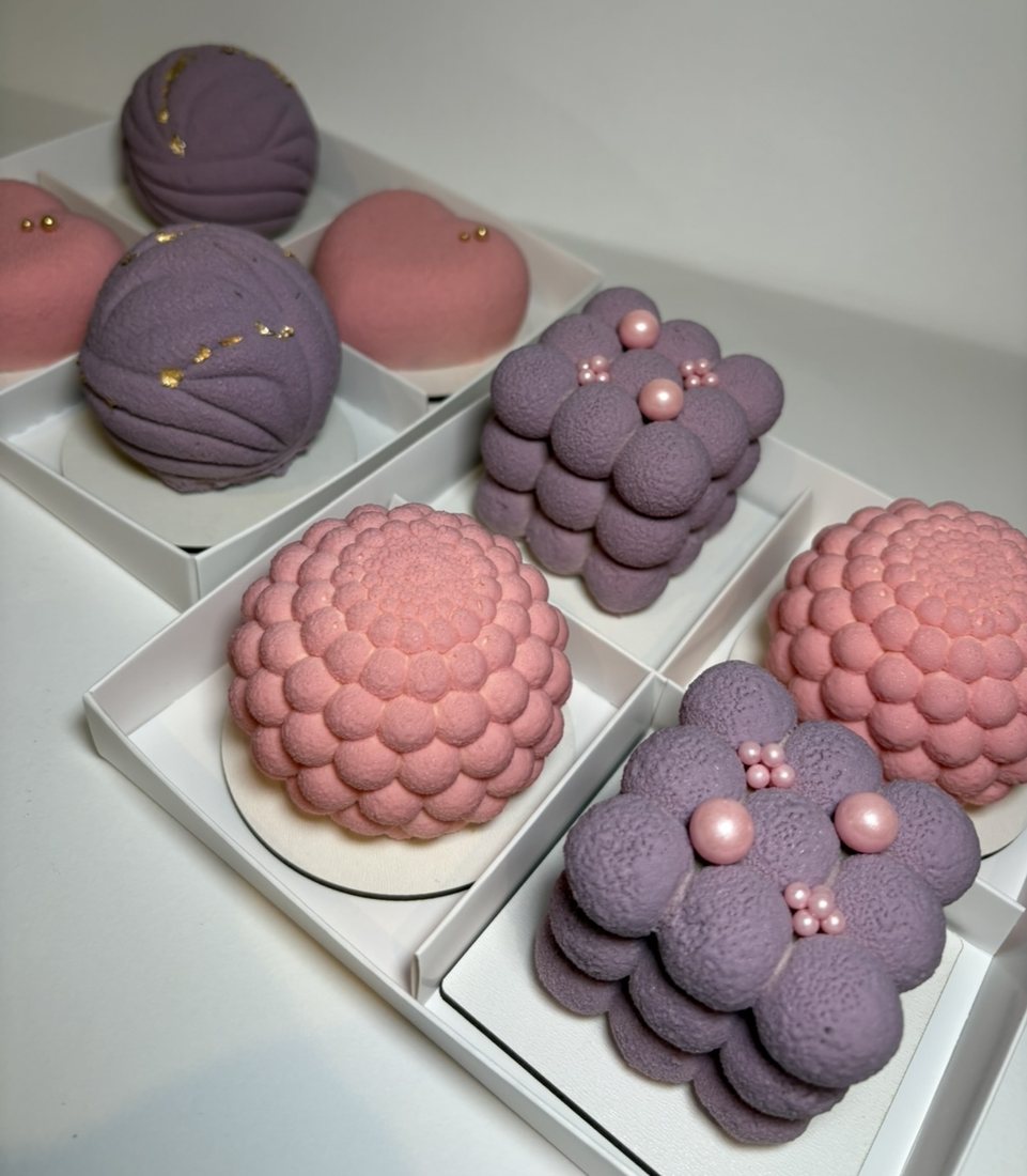 Purple and pink bubble textured mousse cakes with pearl decorations