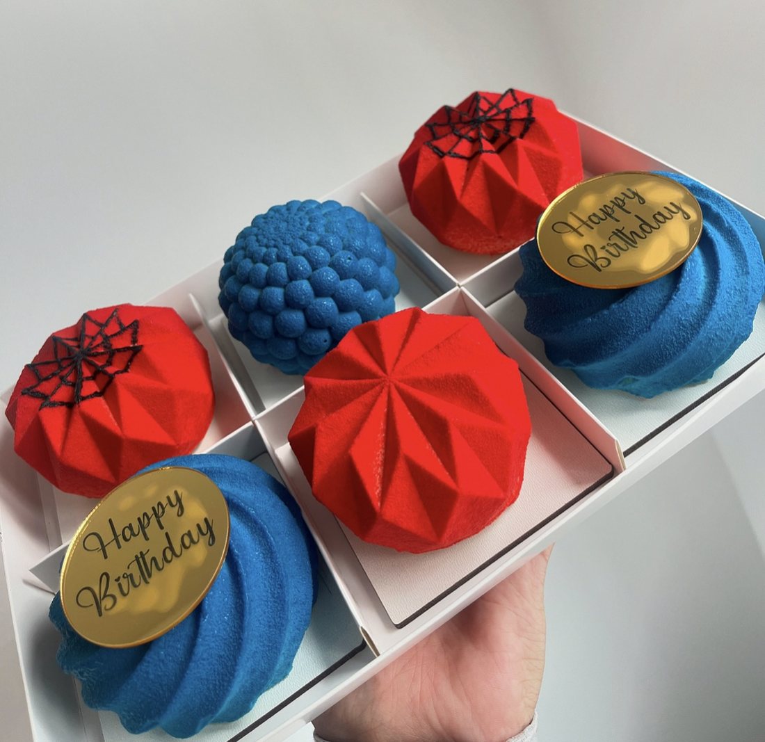 Red and blue spiderweb themed Happy Birthday mousse cake box of six
