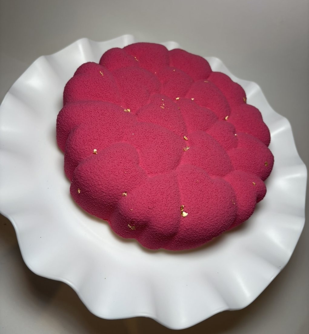 Pink bubble textured mousse cake with gold flecks
